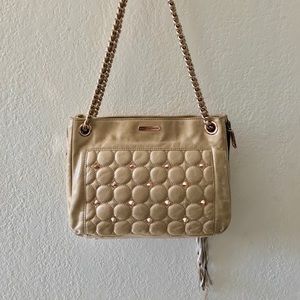 Nude and rose gold Rebecca Minkoff crossbody purse